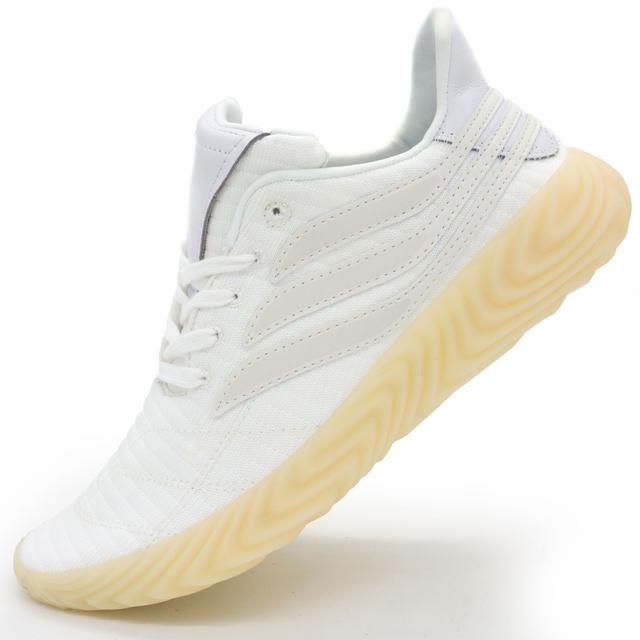 Adidas Sobakov sneakers are white with a yellow sole, reflective. Top quality!