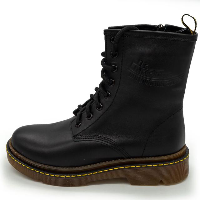 Black women's leather boots with fur in the style of Dr. Martens