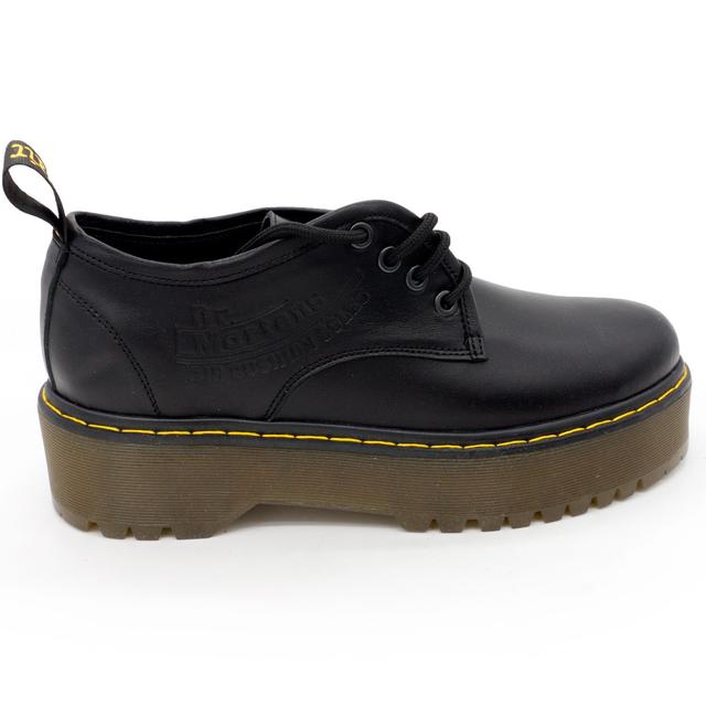 Black women's shoes Dr. Martens on the platform, genuine leather