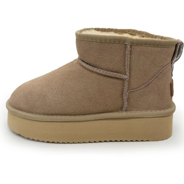 Low beige Uggs on a high sole, platform, black suede