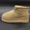 Low beige Uggs on a high sole, platform, black suede