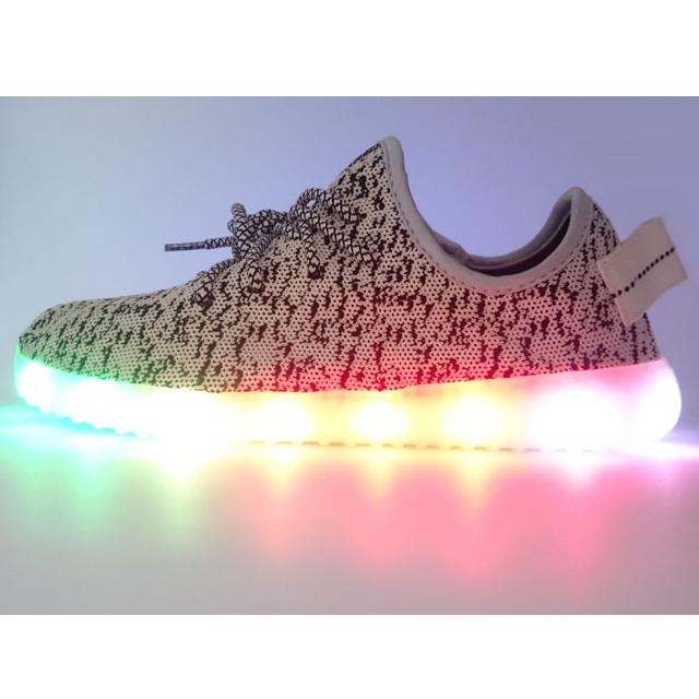 White Yeezy sneakers + LED Symphony