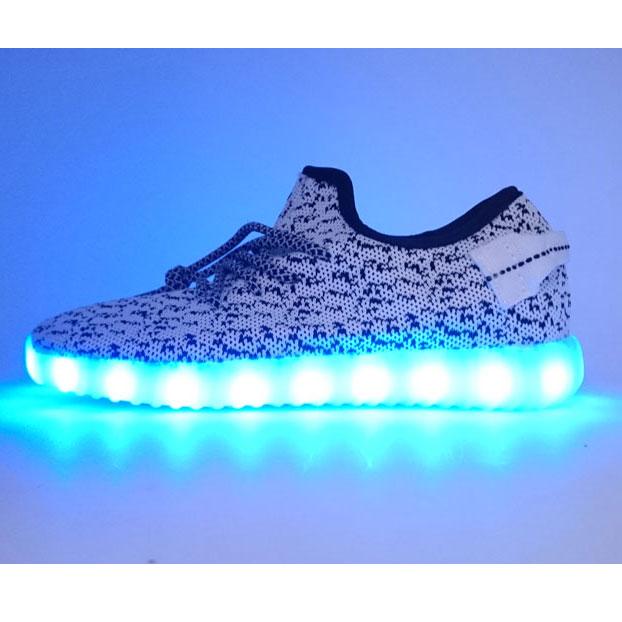 Yeezy white LED light up sneakers.